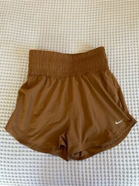 Nike Women's Brown Athletic Running Shorts with White Swoosh